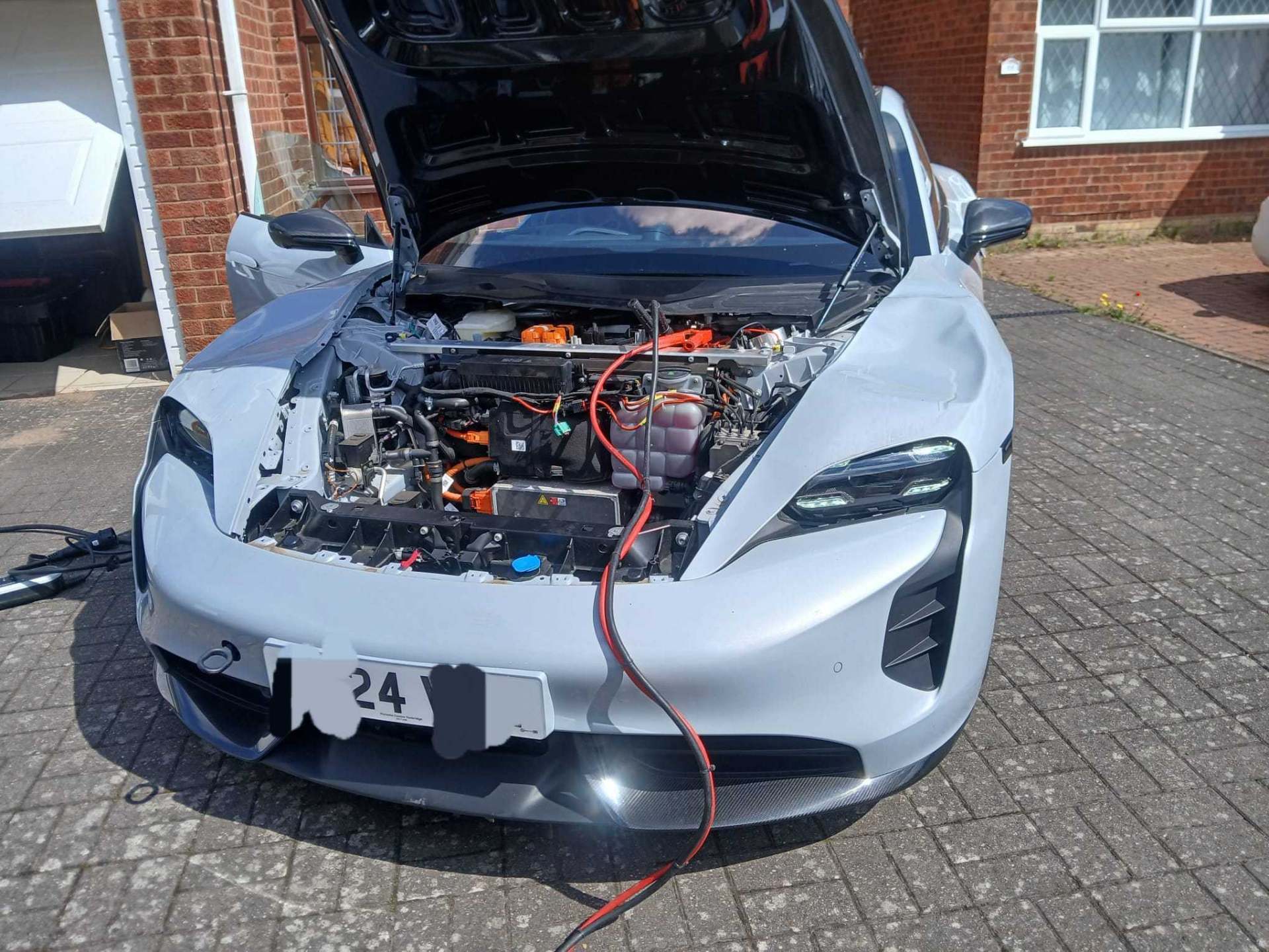 Porsche Taycan — on-site ECU work, customer driveway